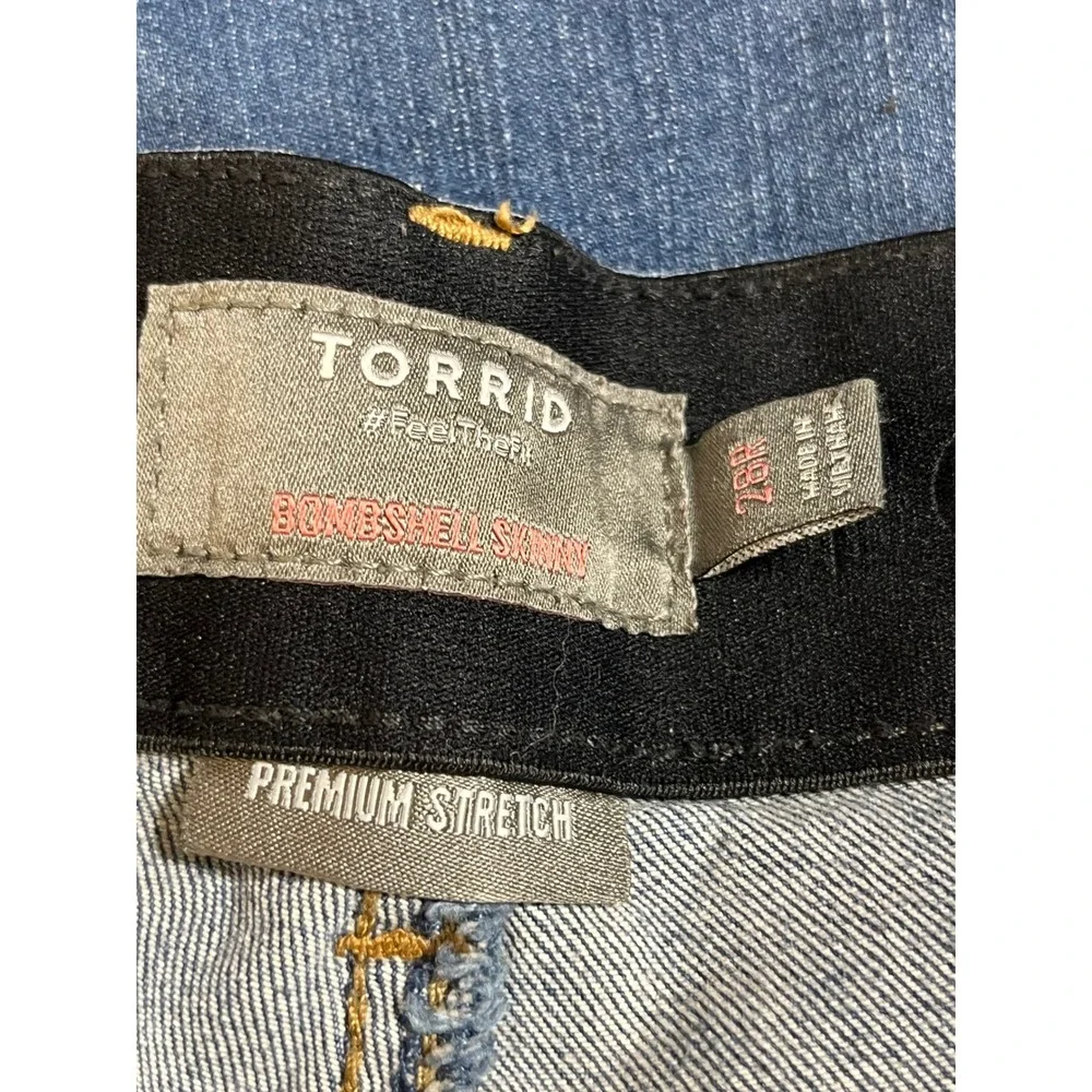 Torrid Bombshell Skinny Jeans 28R Medium Wash Distressed Ripped Raw Hem Blue